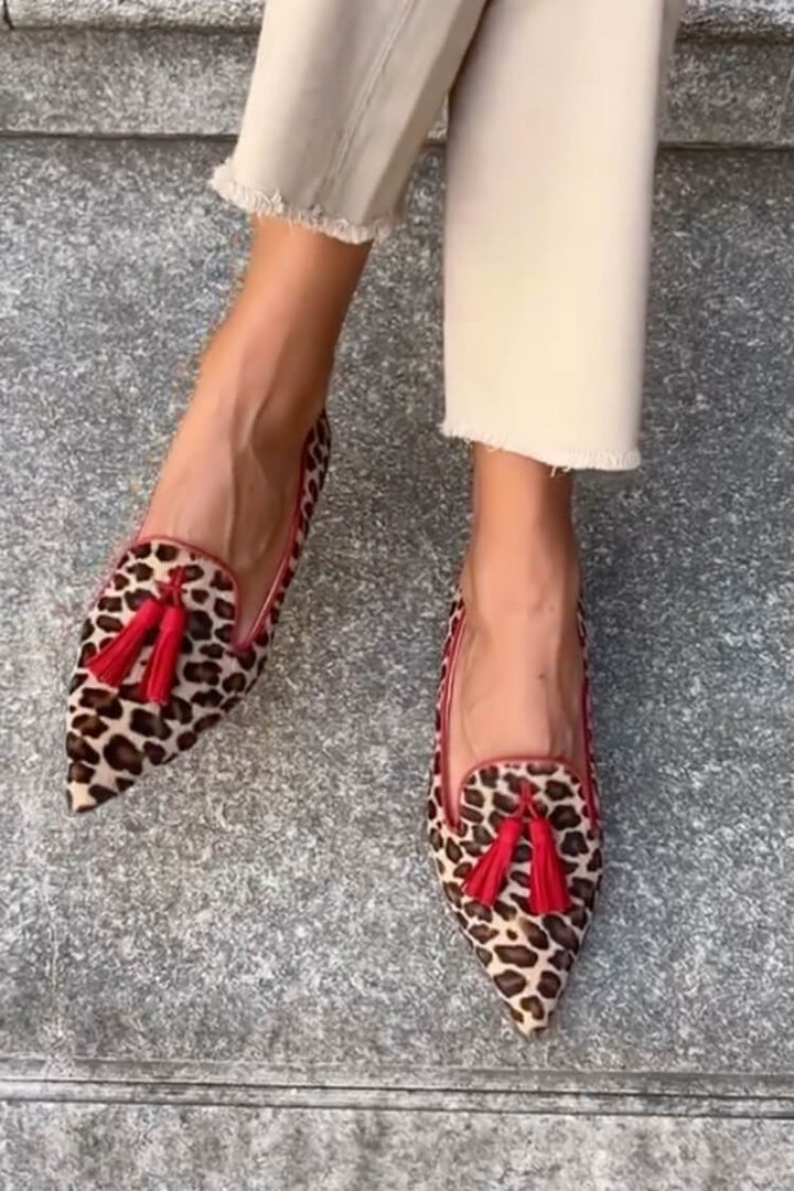 POINTED LOAFERS WITH FRINGE DETAILS