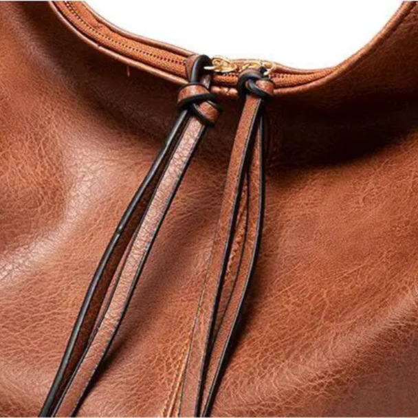 Minerva's Classic Versatility | Vintage Bag