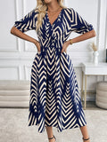 Selina – Geometric Flow Midi Dress