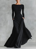 Adele - Modern long black crepe dress with boat neck and pleats